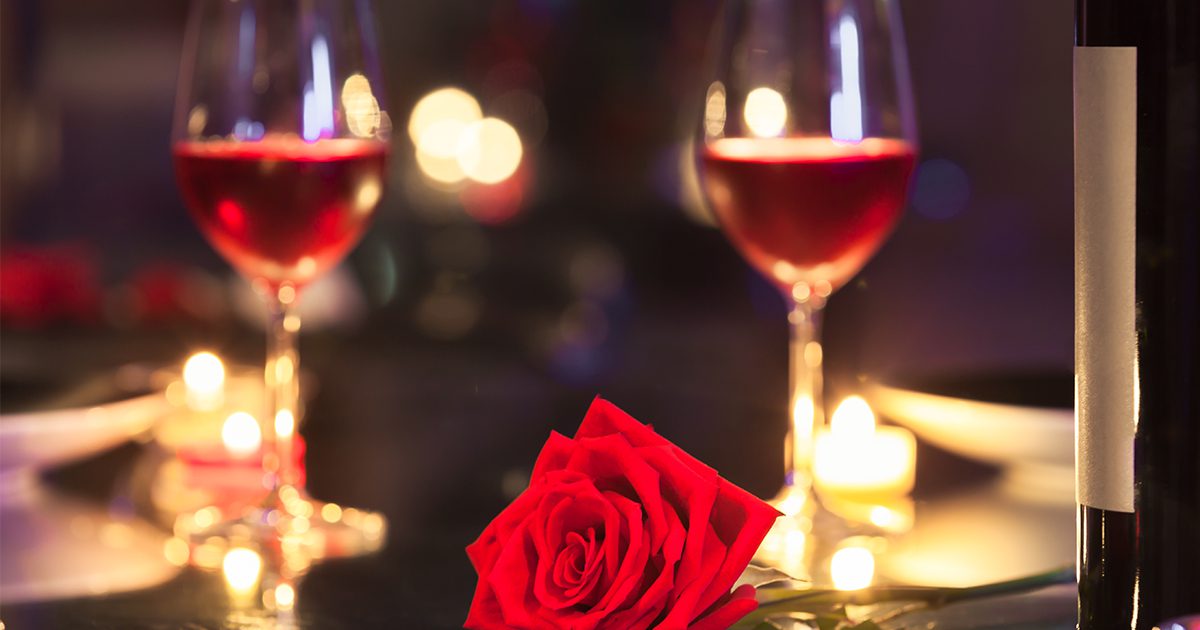 wine glasses and a rose